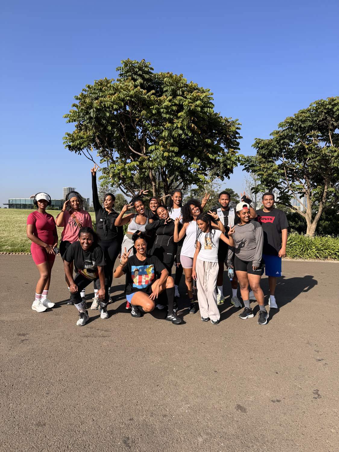 The club posing under the trees at the park